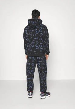 Neu 🌟 KARL KANI X SMILEY® SIGNATURE REGULAR FIT UNISEX - Jogginghose - Black 😍 -Karl Kani Verkäufe 08ddb4089d824c799947faa31e2695c6