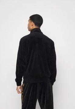 Am billigsten 🎉 Karl Kani TAPE JACKET - Trainingsjacke - Black, Herren ❤️ -Karl Kani Verkäufe 3cce6838f57f49819ef454c76f42b651