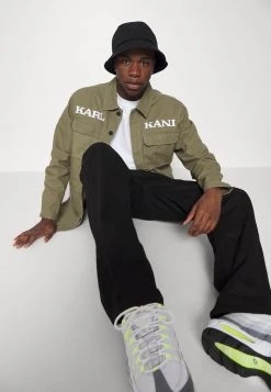 Großhandel 🛒 Karl Kani RETRO WASHED UTILITY JACKET - Leichte Jacke - Dark Green, Herren ✔️ -Karl Kani Verkäufe 464a833b23cf4766a531cfb9ad33a066