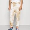 Schlussverkauf ✔️ Karl Kani SIGNATURE TIE DYE UNISEX - Jogginghose - White ⭐