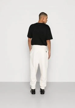 Rabatt ⌛ Karl Kani SMALL SIGNATURE UNISEX - Jogginghose - Cream ✨ -Karl Kani Verkäufe 6107abc0a7fc4bb19671da6e0cf23ec5
