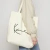 Besorgen ✔️ Karl Kani SIGNATURE SHOPPER - Shopping Bag - Cream, Unisex 😉