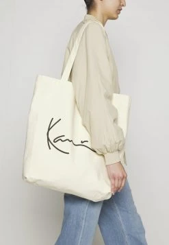 Besorgen ✔️ Karl Kani SIGNATURE SHOPPER - Shopping Bag - Cream, Unisex 😉