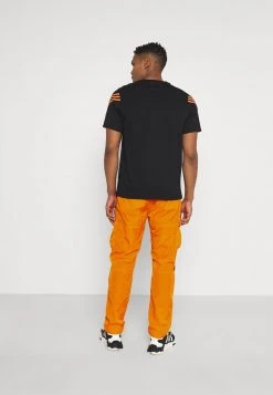 Besorgen 🔔 Karl Kani SIGNATURE CRINCLE PANTS UNISEX - Cargohose - Orange 😀 -Karl Kani Verkäufe 8fdbb43b41074a31a267a20a3406541e