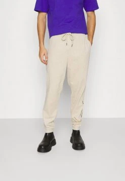 Bester Verkauf ✨ Karl Kani SIGNATURE UNISEX - Jogginghose - Light Sand 🧨