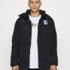 Angebote ⌛ Karl Kani LONG HOODED PUFFER JACKET UNISEX - Wintermantel - Black 🔔 -Karl Kani Verkäufe 9866aa213ba340b0b8e325bc8060dd0f