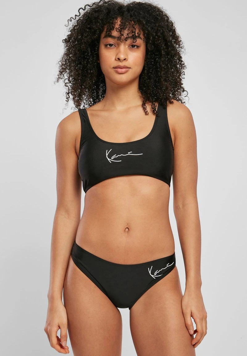 Rabatt 💯 Karl Kani ✔️ Bikini-Hose - Black, Damen ⭐ 1 Rabatt 💯 Karl Kani ✔️ Bikini-Hose - Black, Damen ⭐