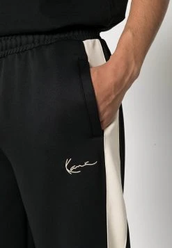 Am billigsten 🤩 Karl Kani SMALL SIGNATURE TRACKPANTS - Jogginghose - Black, Herren ✔️ -Karl Kani Verkäufe a14f2f49ad394289816fb52990b4623f