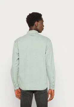 Aktion 🔥 Karl Kani CHEST SIGNATURE WASHED UNISEX - Hemd - Dark Mint ⭐ -Karl Kani Verkäufe d4af8ee5c6434bb599ceab7f53a3c151