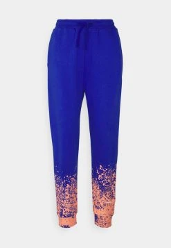 Brandneu 👏 Karl Kani SIGNATURE PAINT SPLATTER - Jogginghose - Blue, Damen 🛒 -Karl Kani Verkäufe e0b279e6f7de45dbac441bd1125a6b43