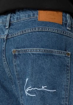 Großhandel 👍 Karl Kani SMALL SIGNATURE BAGGY - Jeans Relaxed Fit - Dark Indigo, Herren ⌛ -Karl Kani Verkäufe e4945d7740aa4b5281573354232f0788