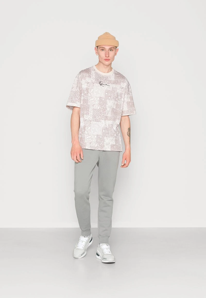 Brandneu 🎁 Karl Kani SMALL SIGNATURE TEE LIGHT UNISEX - T-Shirt Print - Sand 😉 2 Brandneu 🎁 Karl Kani SMALL SIGNATURE TEE LIGHT UNISEX - T-Shirt Print - Sand 😉 – Bild 2