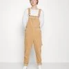 Beste Bewertungen von ✔️ Karl Kani RETRO DUNGAREE UNISEX - Stoffhose - Sand 😍 -Karl Kani Verkäufe f68fcfdc67c543d98f93380af0cffa4e