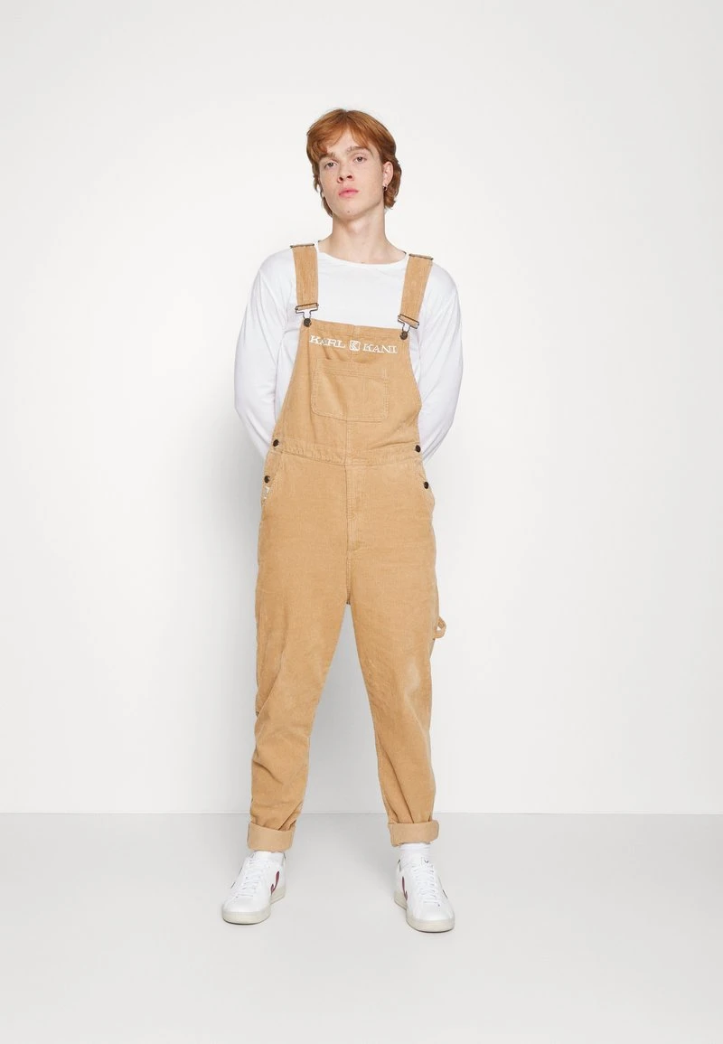 Beste Bewertungen von ✔️ Karl Kani RETRO DUNGAREE UNISEX - Stoffhose - Sand 😍 1 Beste Bewertungen von ✔️ Karl Kani RETRO DUNGAREE UNISEX - Stoffhose - Sand 😍